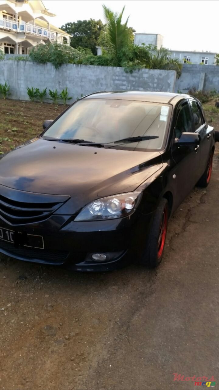 2004' Mazda Axela photo #2