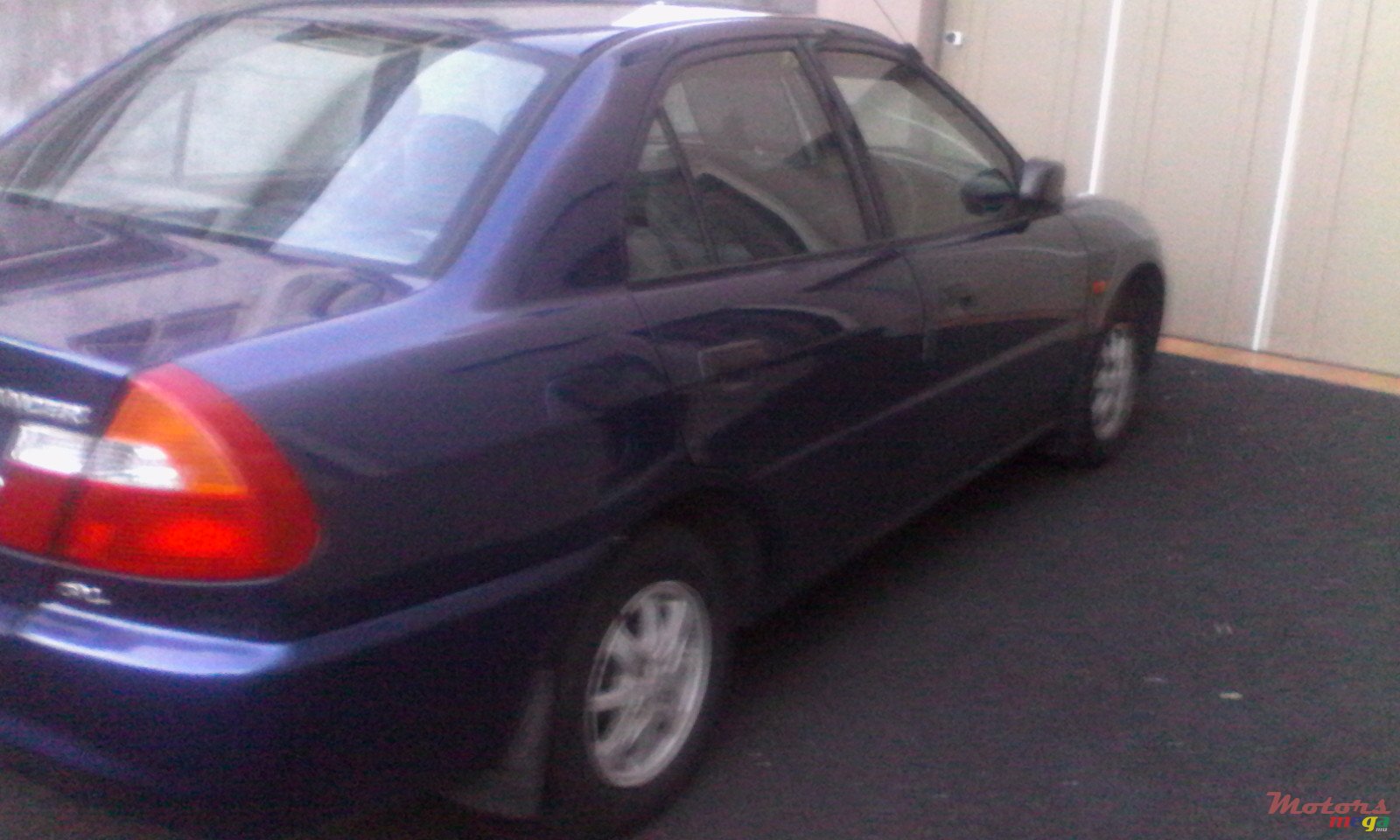 1999' Mitsubishi Lancer Genuine photo #1