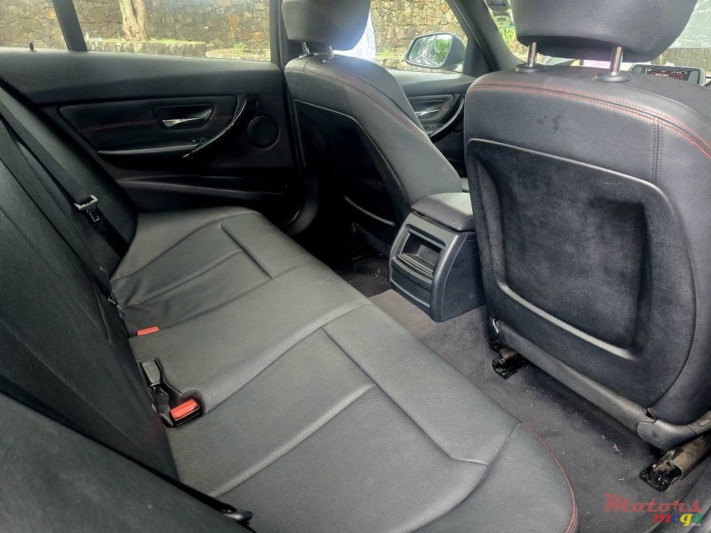 2013' BMW 316 photo #5