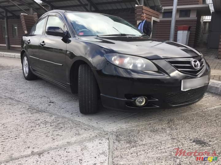 2004' Mazda 3 photo #1