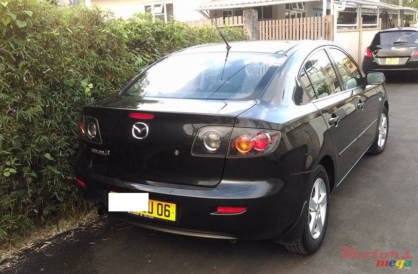 2006' Mazda 3 manual photo #2