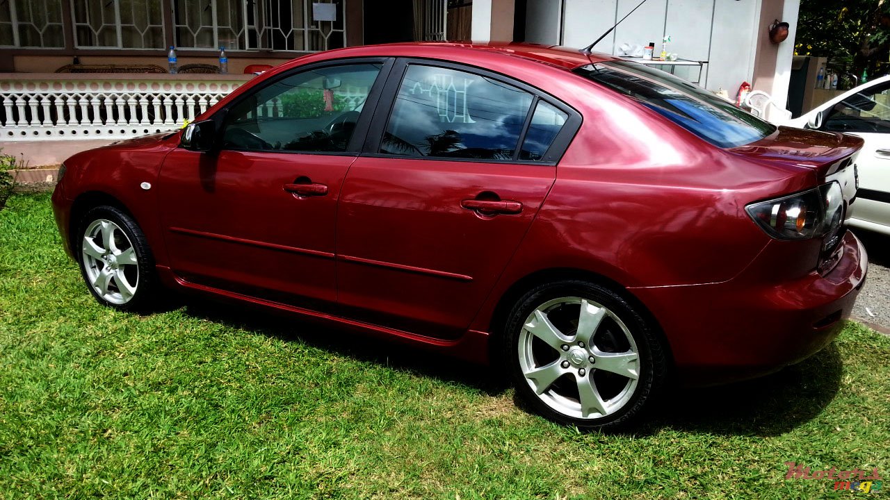 2004' Mazda 3 photo #1