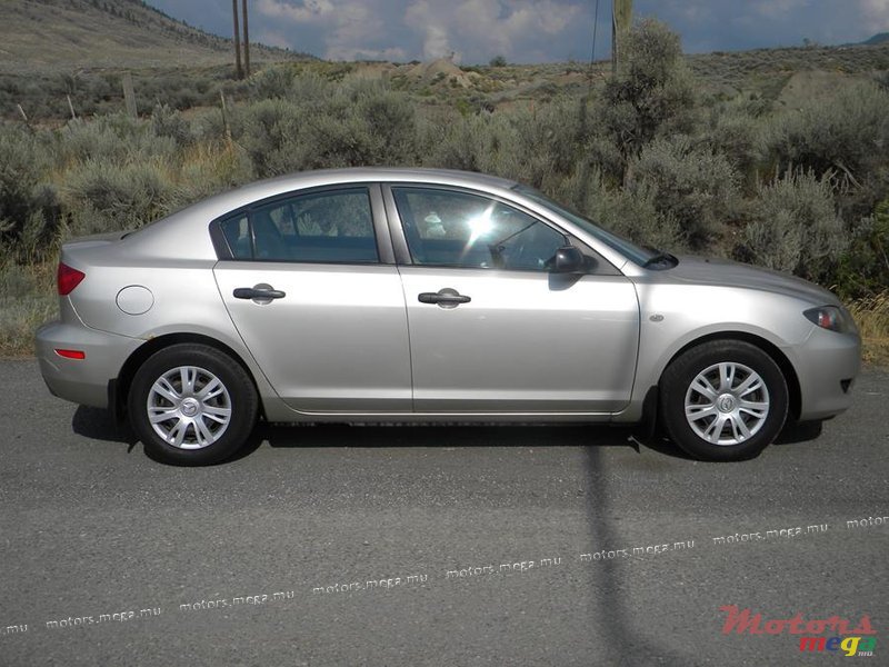 2004' Mazda 3 photo #1