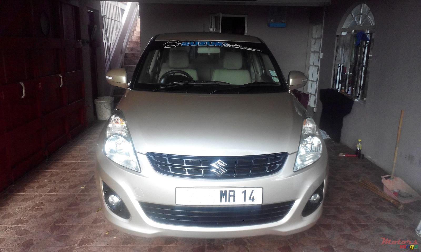 2014' Suzuki SA310 Swift photo #1