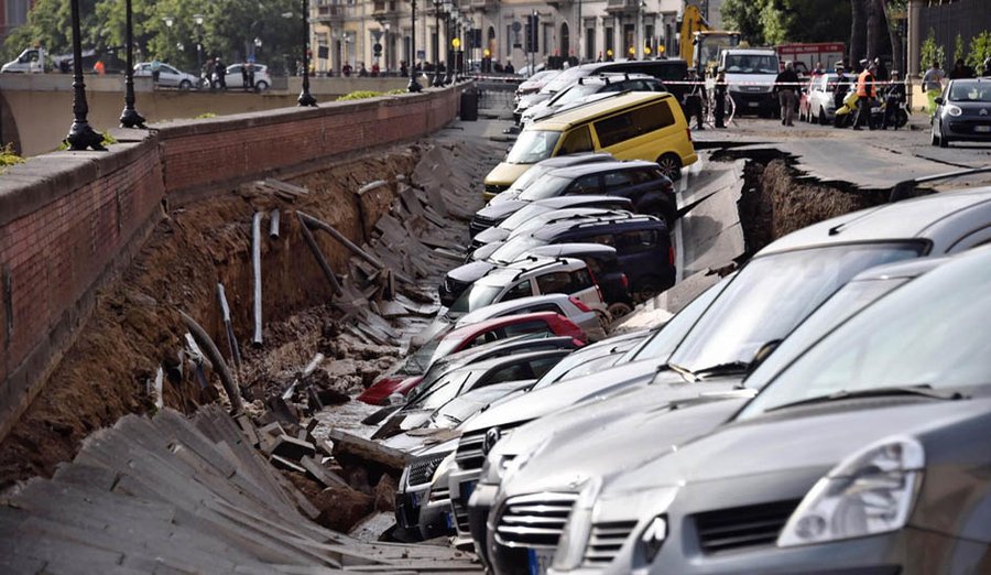 Watch Dozens Of Cars Swallowed By Sinkhole In Italy