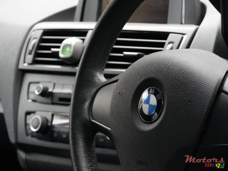 2011' BMW 116 photo #5