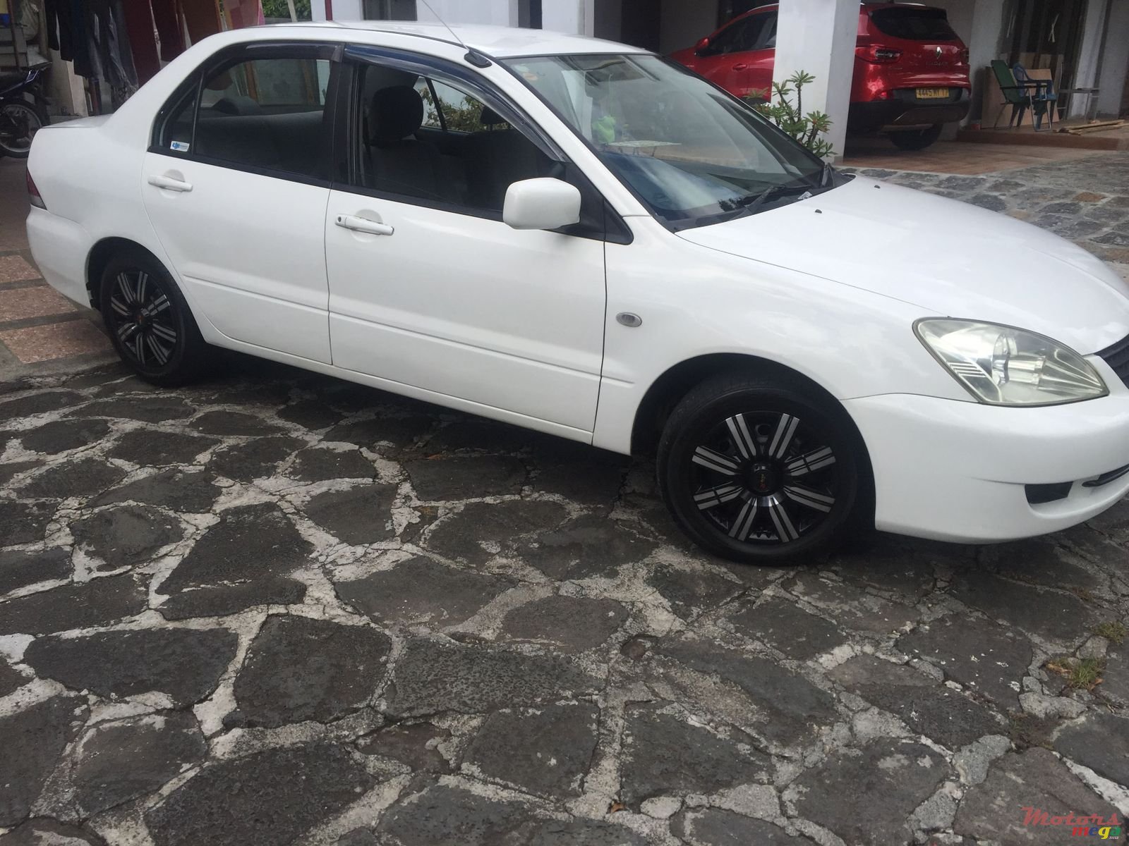 2006' Mitsubishi Lancer photo #1