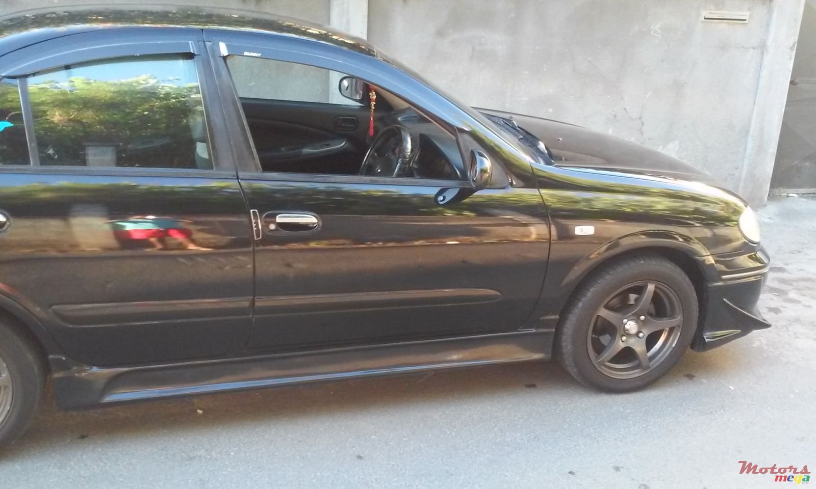 2006' Nissan Sunny photo #3