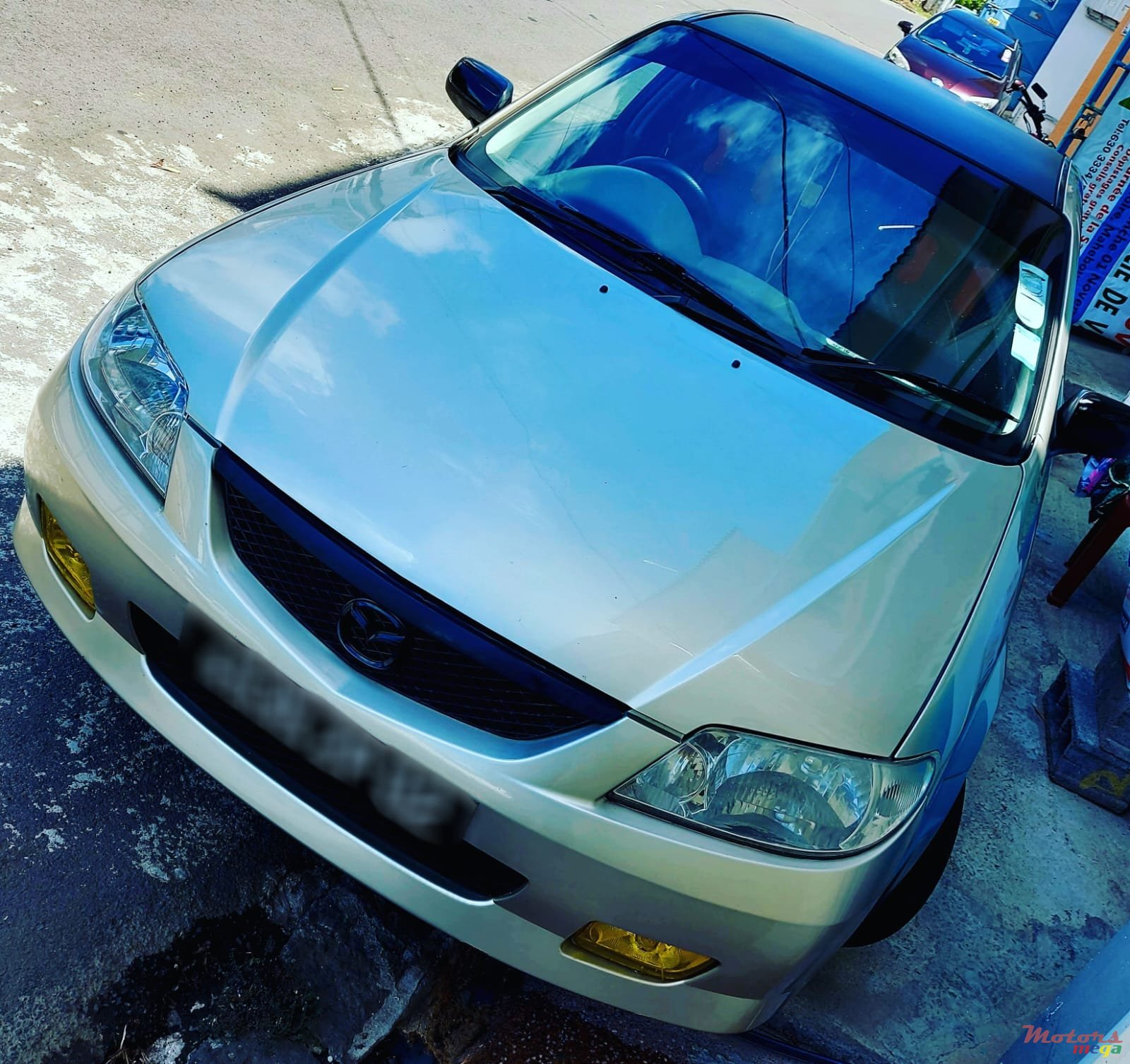 2002' Mazda 323 Dorigine photo #1