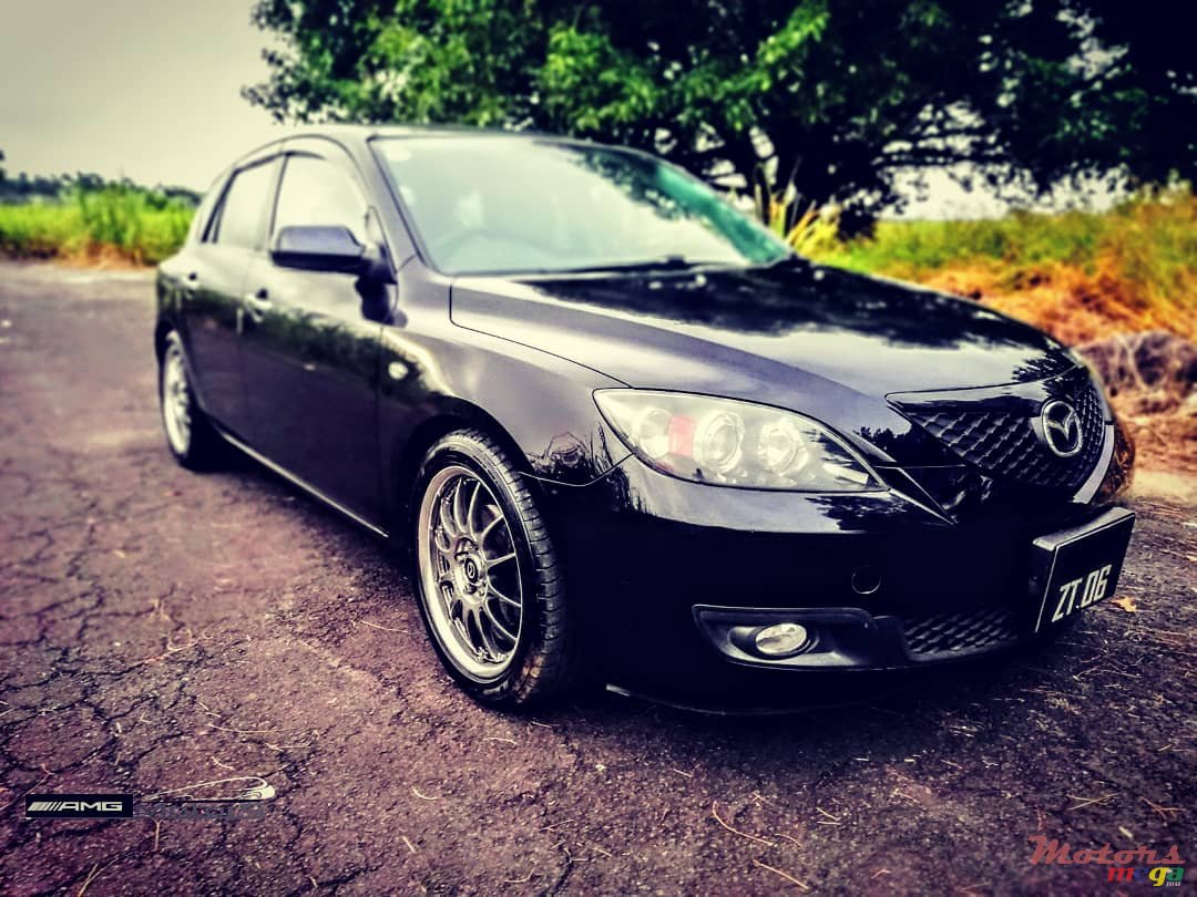 2006' Mazda Axela 1.5 Japan photo #1