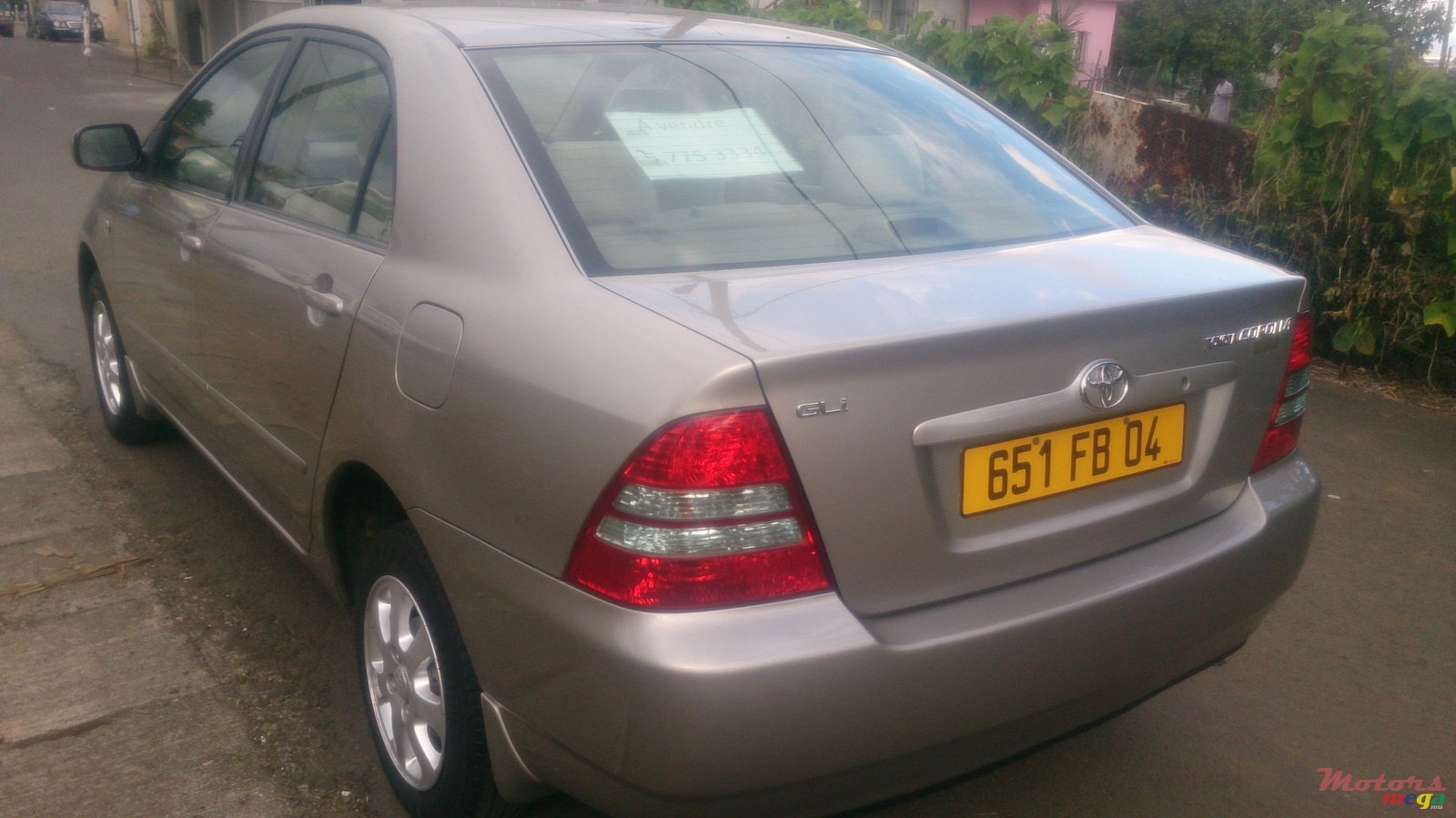 2004' Toyota Corolla nze luxel photo #1