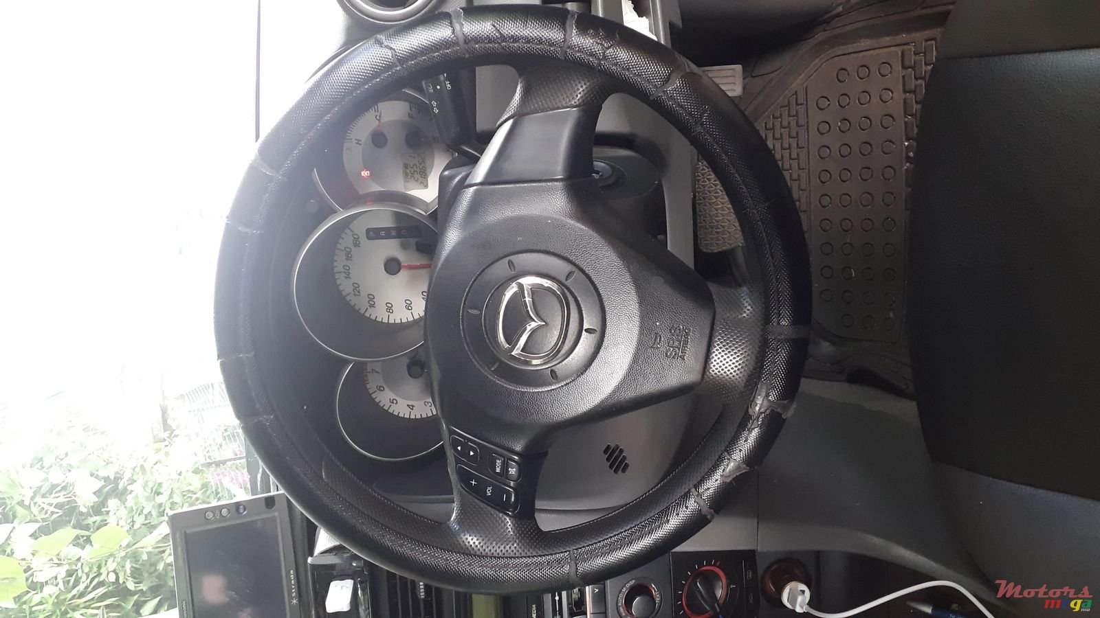 2006' Mazda 3 photo #1