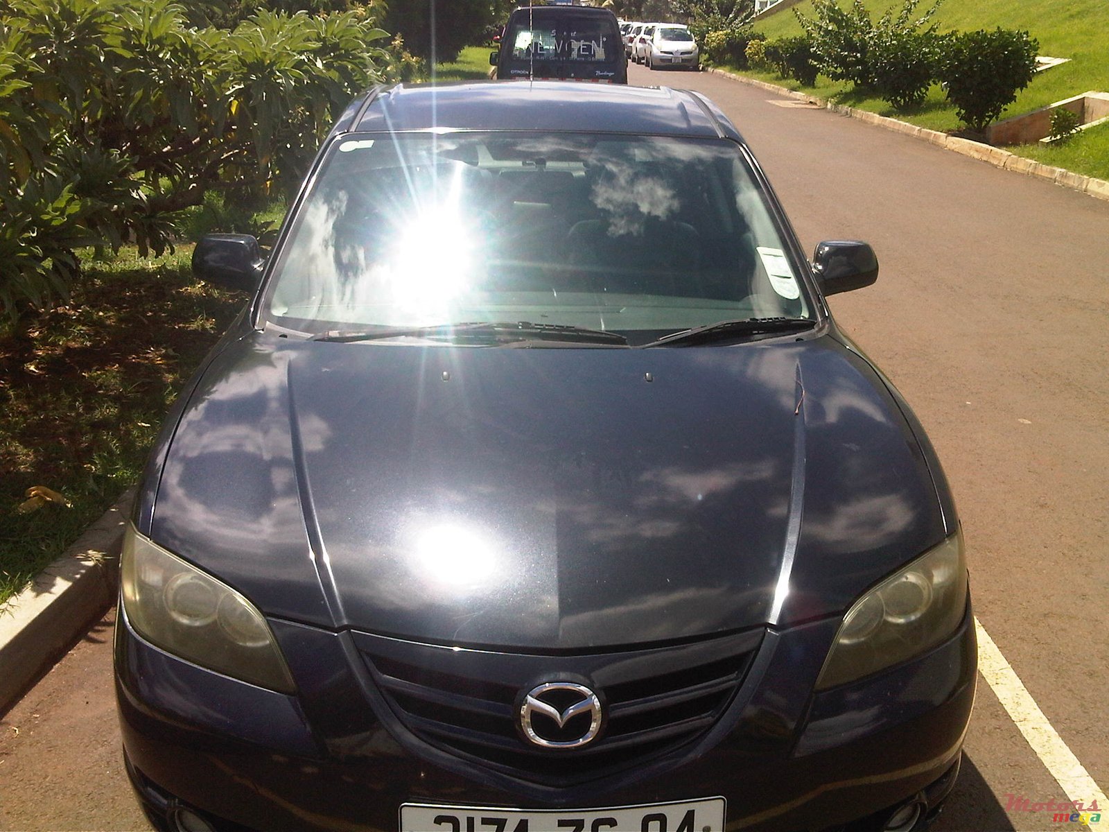 2004' Mazda 3 photo #1