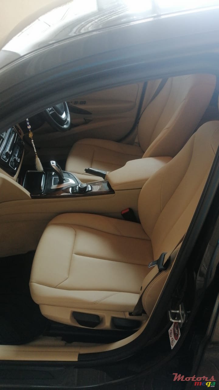 2015' BMW 318 photo #1