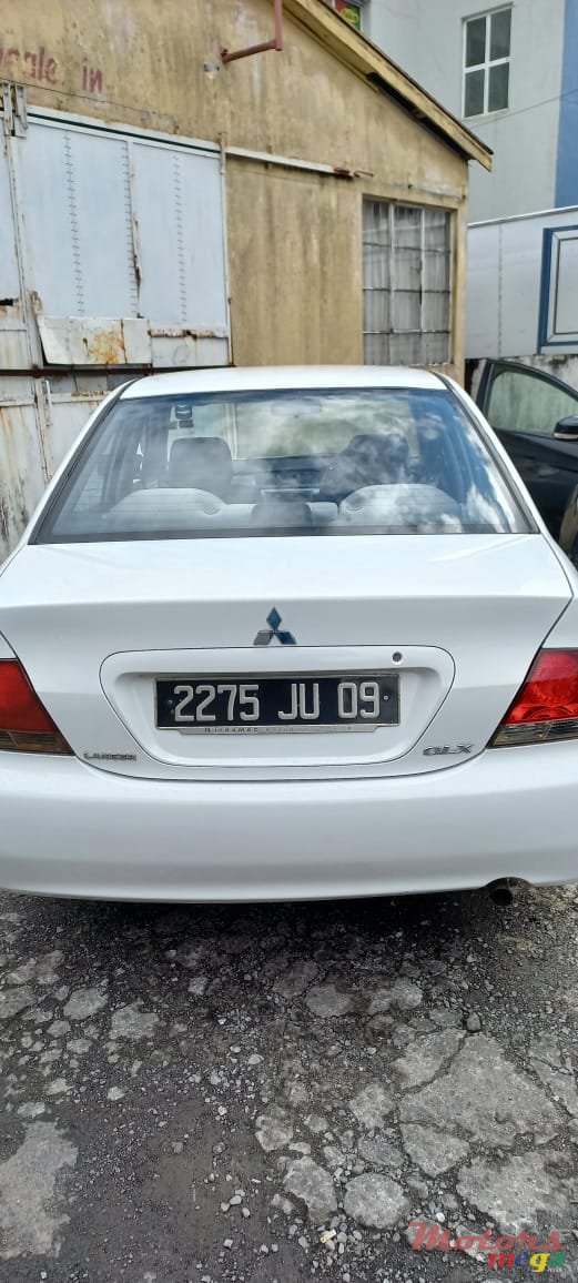 2009' Mitsubishi Lancer Glx photo #2