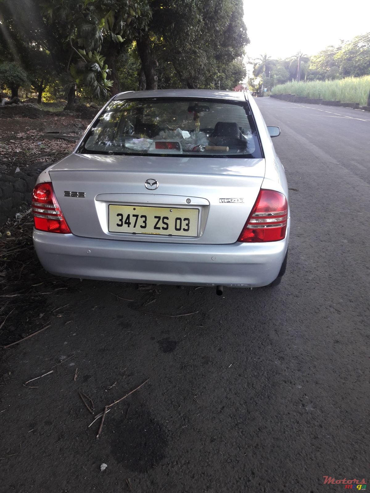 2003' Mazda 323 photo #1