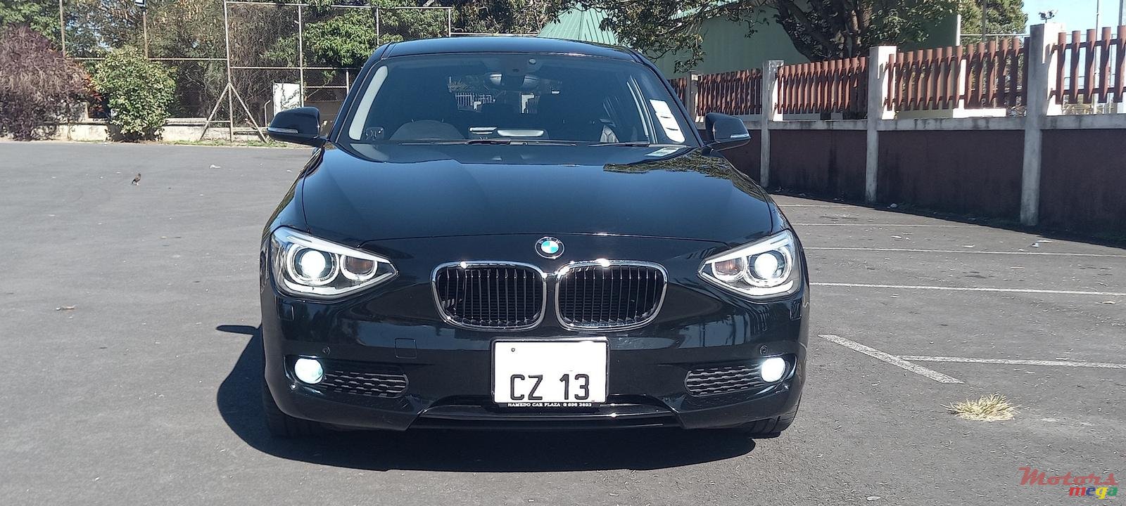 2013' BMW 1 Series 5 Door 116i photo #1