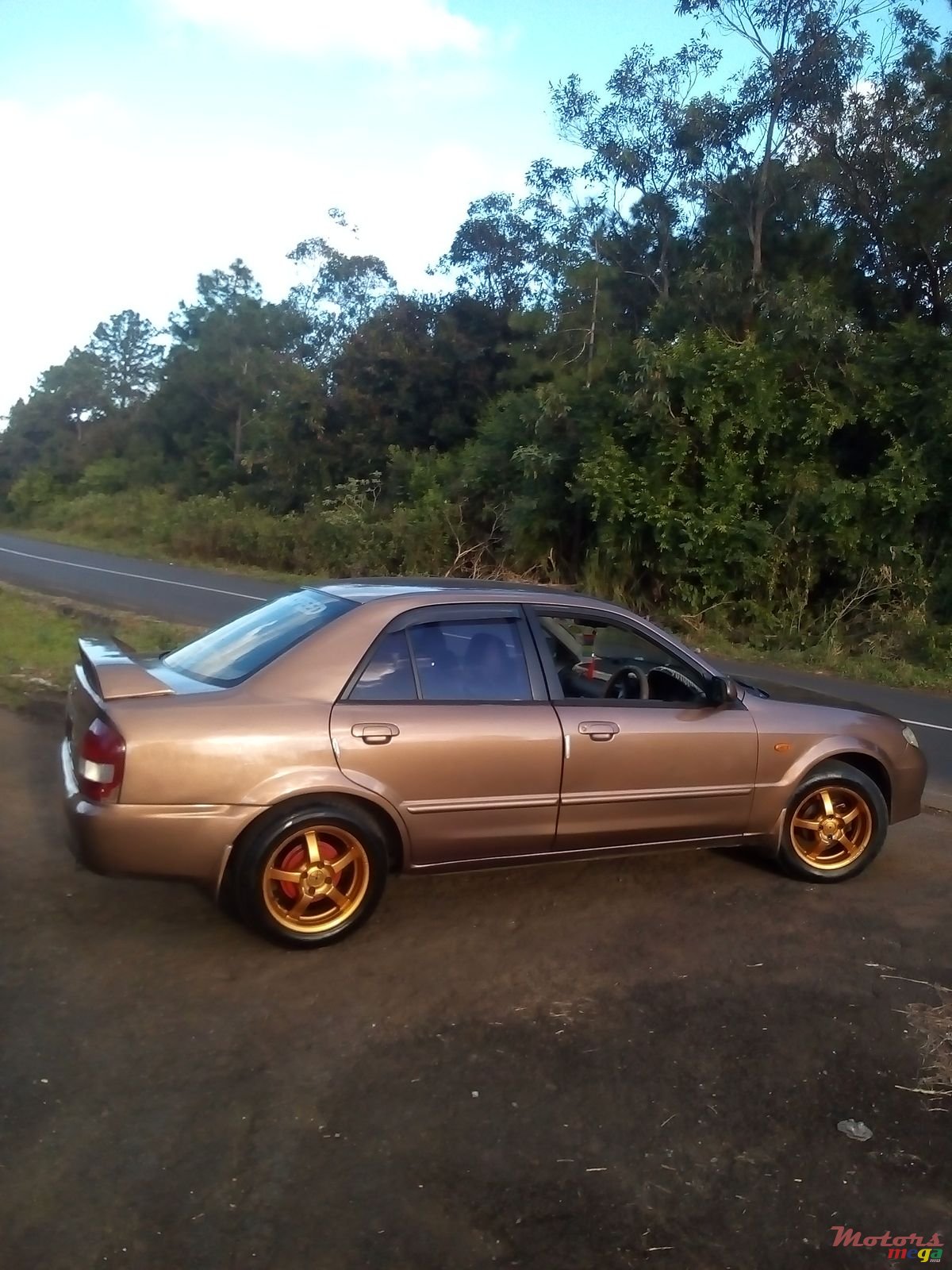 2002' Mazda 323 photo #4
