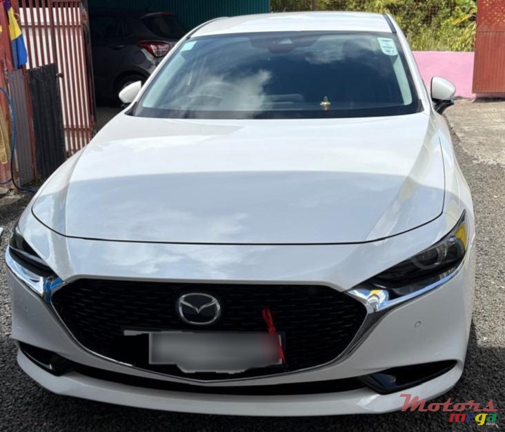 2021' Mazda 3 Skyactive photo #1
