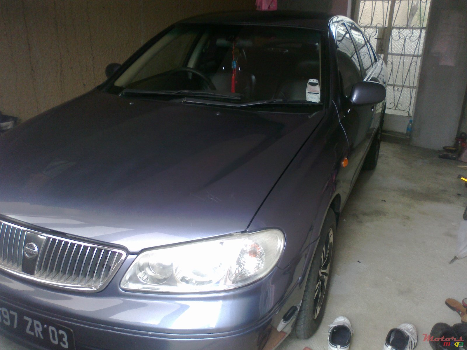 2003' Nissan Sunny original photo #1