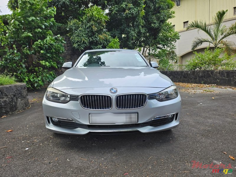 2014' BMW 116 Luxury Line photo #1