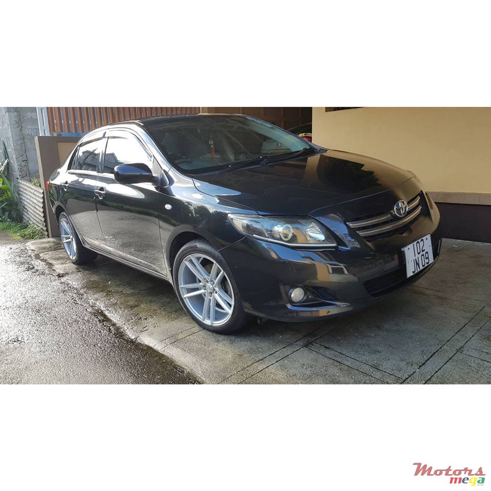 2009' Toyota Corolla photo #1