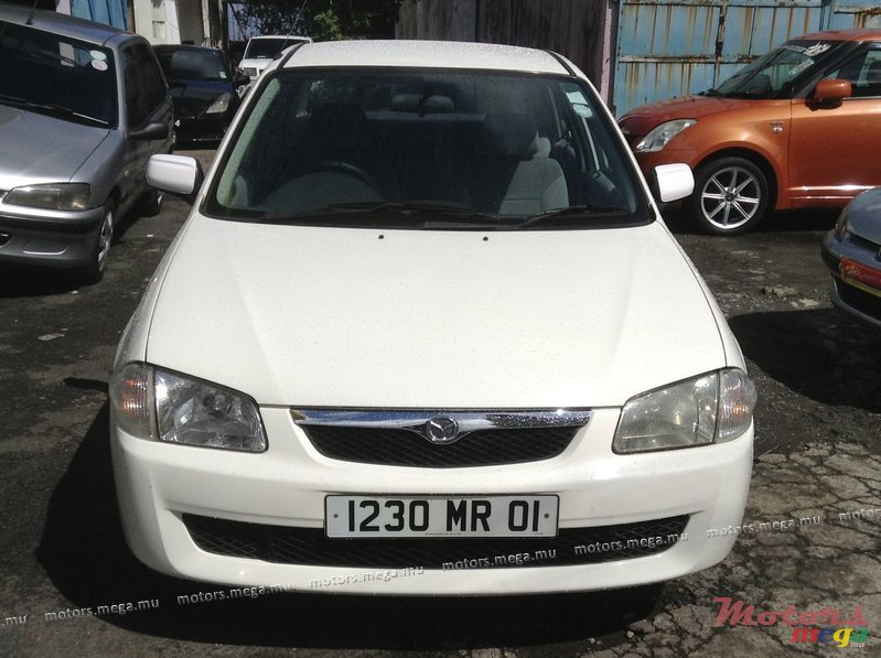 2001' Mazda 323 photo #1