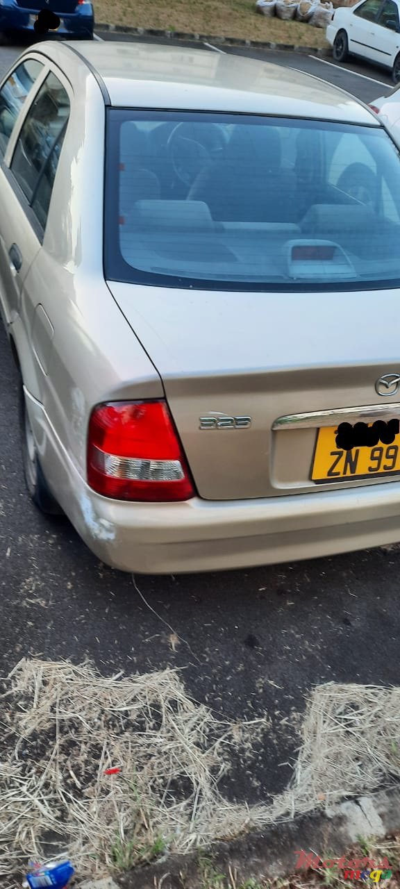 1999' Mazda 323 photo #4