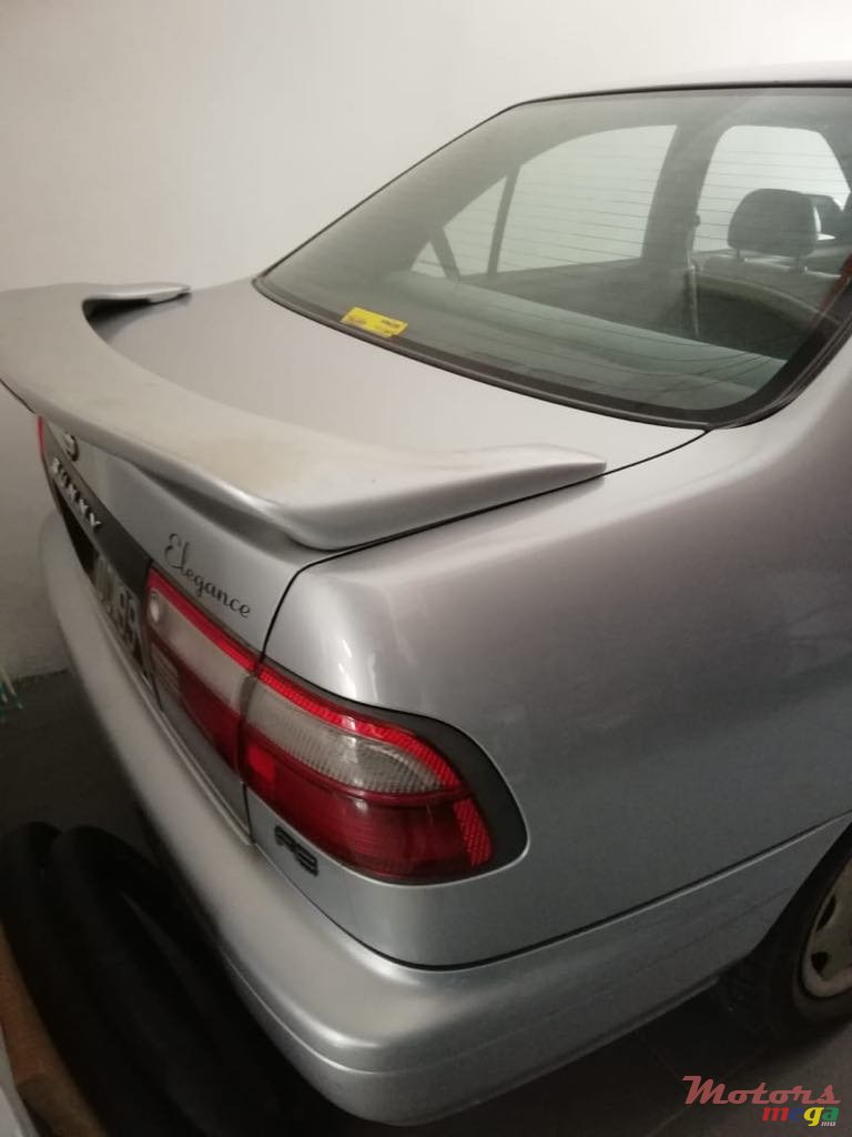 1999' Nissan Sunny photo #1