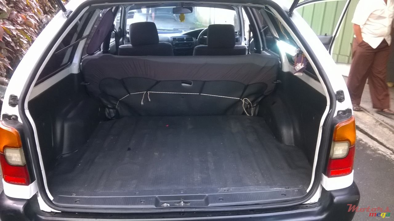 2002' Toyota Corolla spoiler..CD player etc photo #6