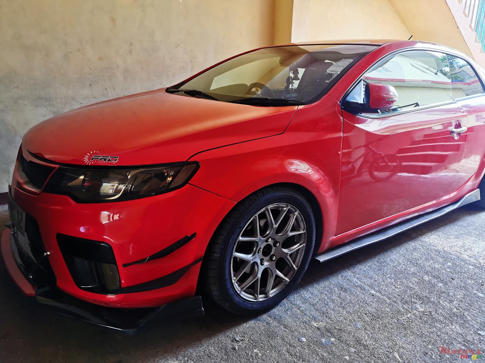 2012' Kia Koup photo #2