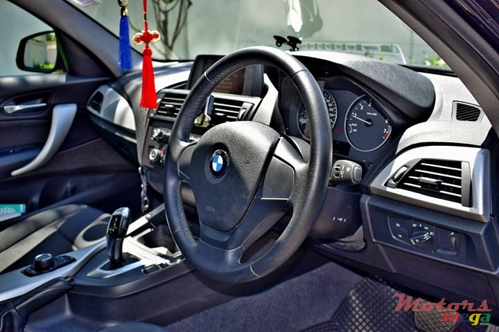 2012' BMW 116 photo #7