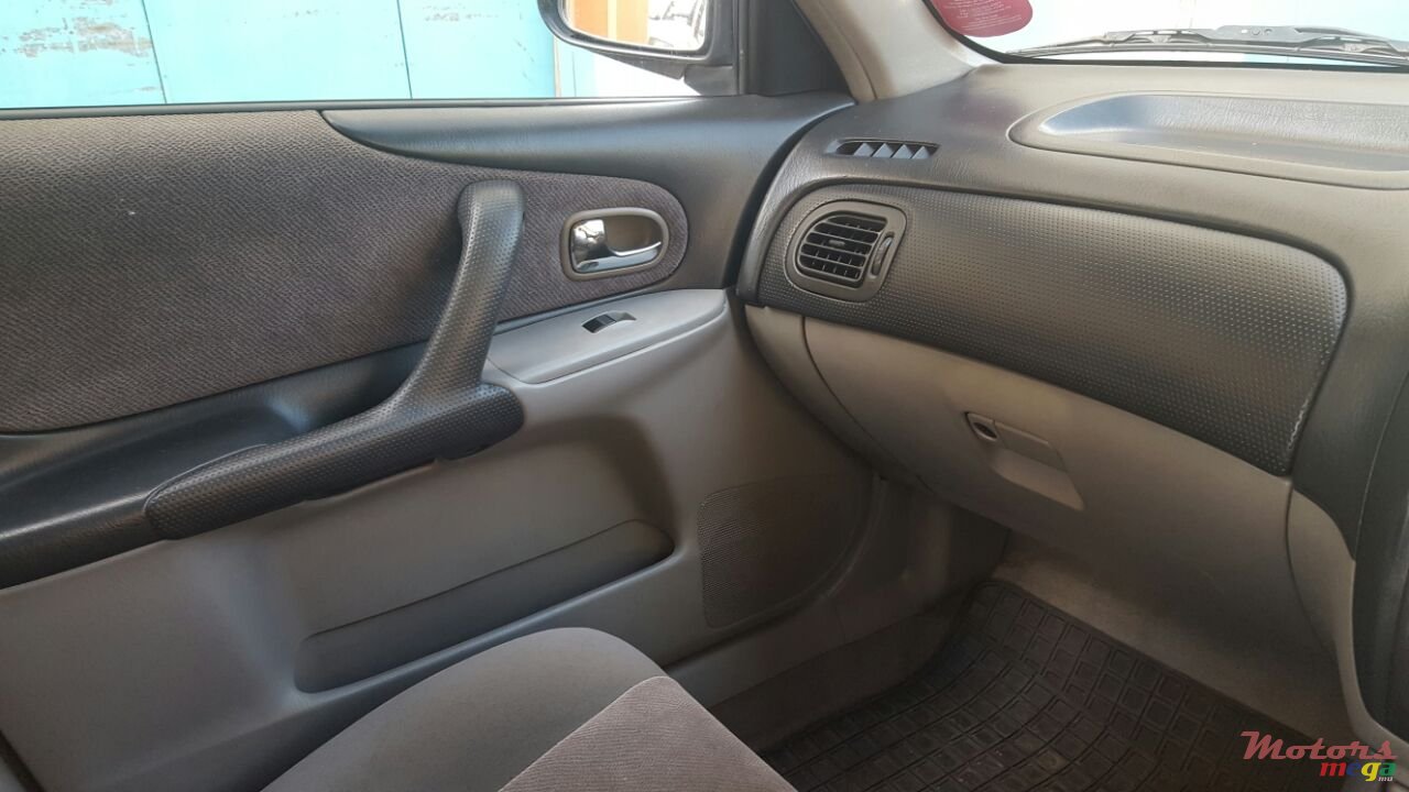 2004' Mazda Familia jante cosmic photo #2