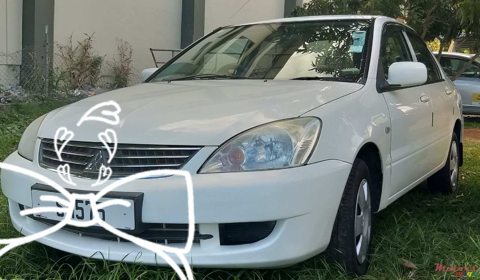 2012' Mitsubishi Lancer photo #2