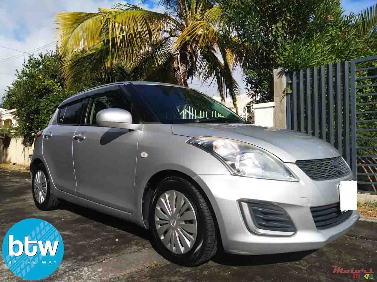 2014' Suzuki Swift photo #1