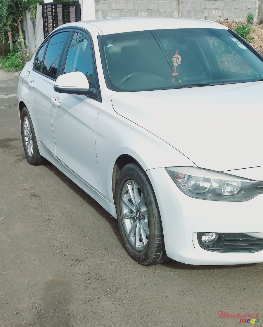 2013' BMW 116 photo #3