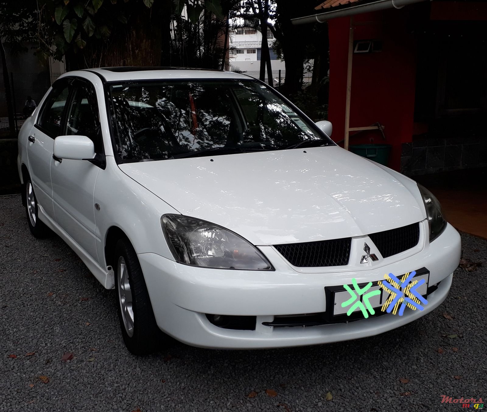 2006' Mitsubishi Lancer photo #1