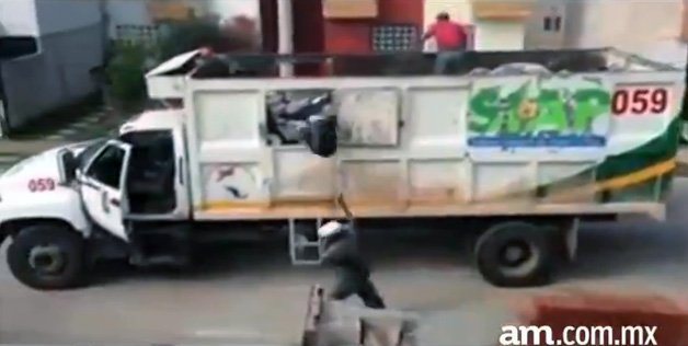 Watch These Workers Ghost-Ride the Garbage Truck With Purpose