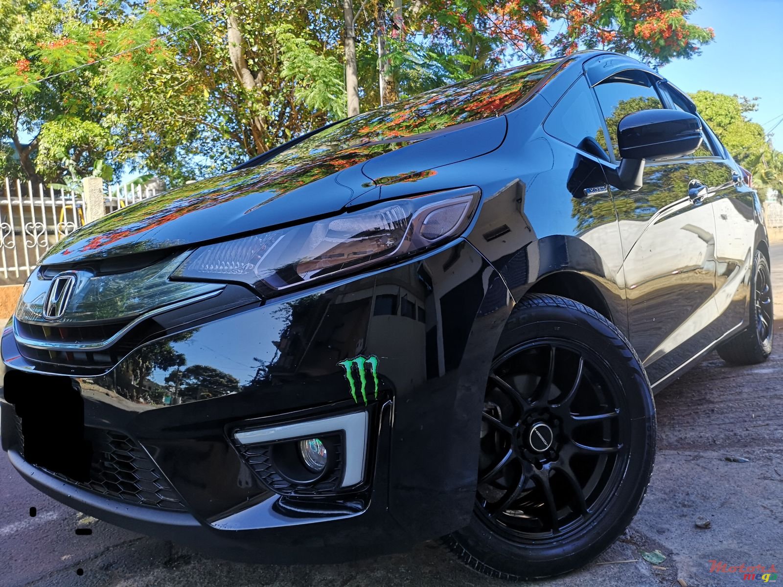 2014' Honda Fit Hybrid photo #1