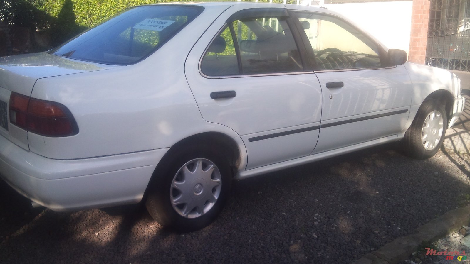 2007' Nissan Sunny photo #2