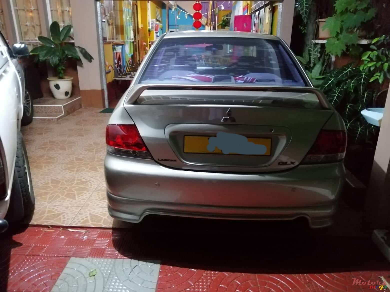 2004' Mitsubishi Lancer photo #6