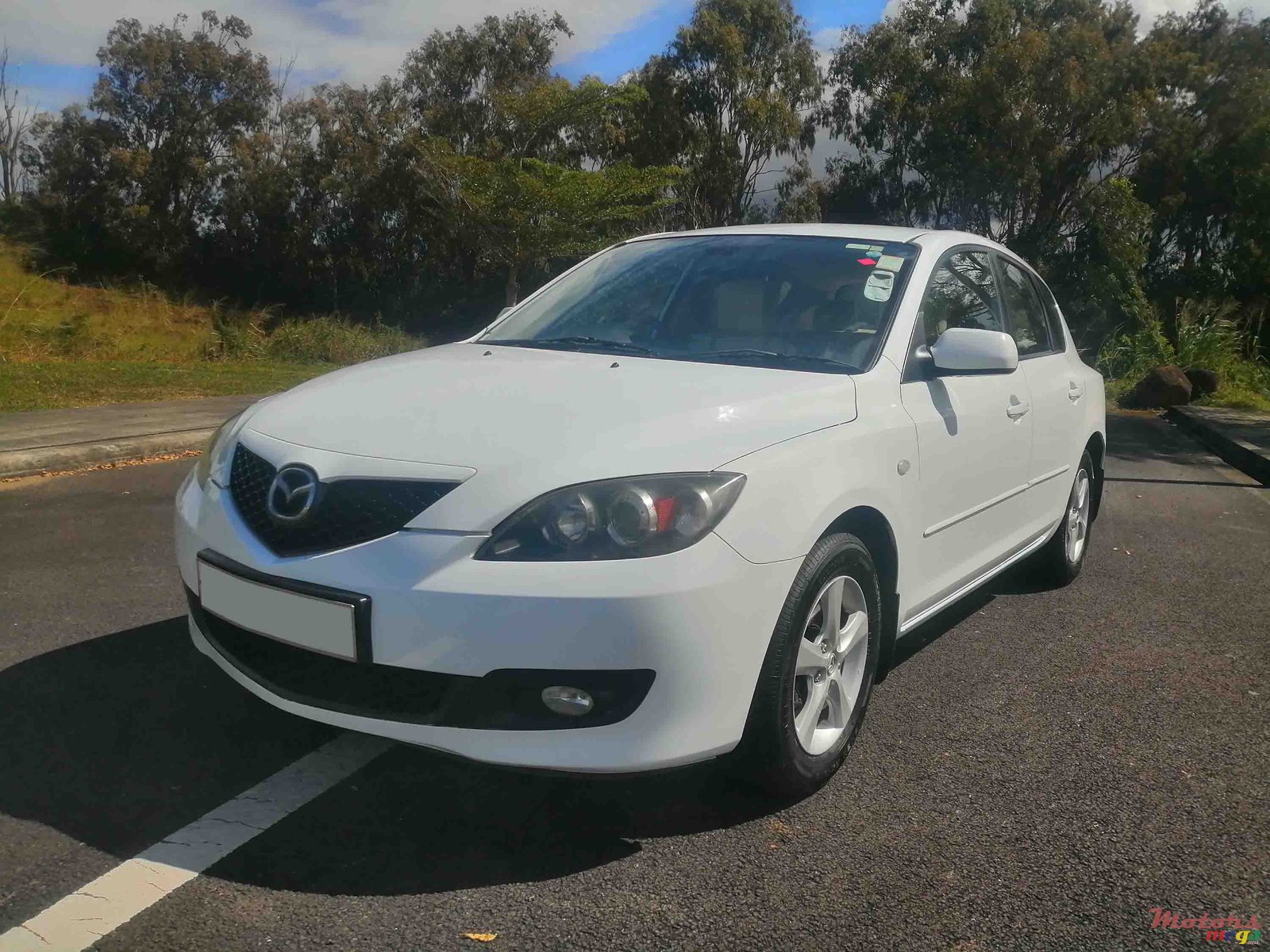 2007' Mazda 3 photo #1