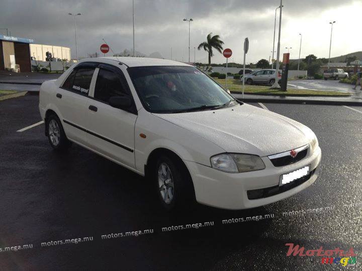 1999' Mazda 323 photo #1