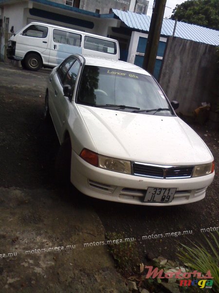 1999' Mitsubishi Lancer glx photo #1