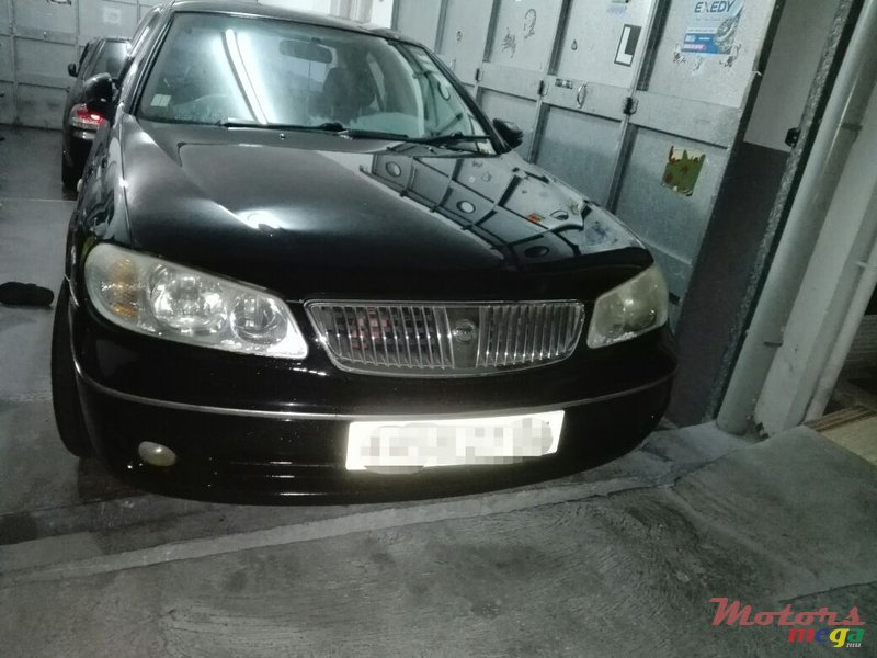 2004' Nissan Sunny photo #2