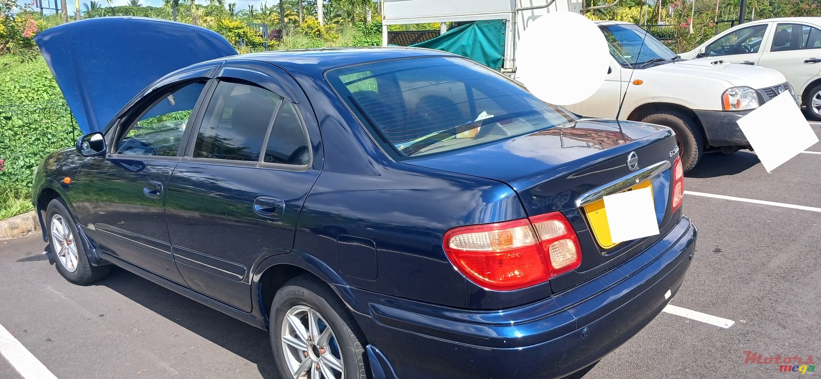 2002' Nissan Sunny photo #1