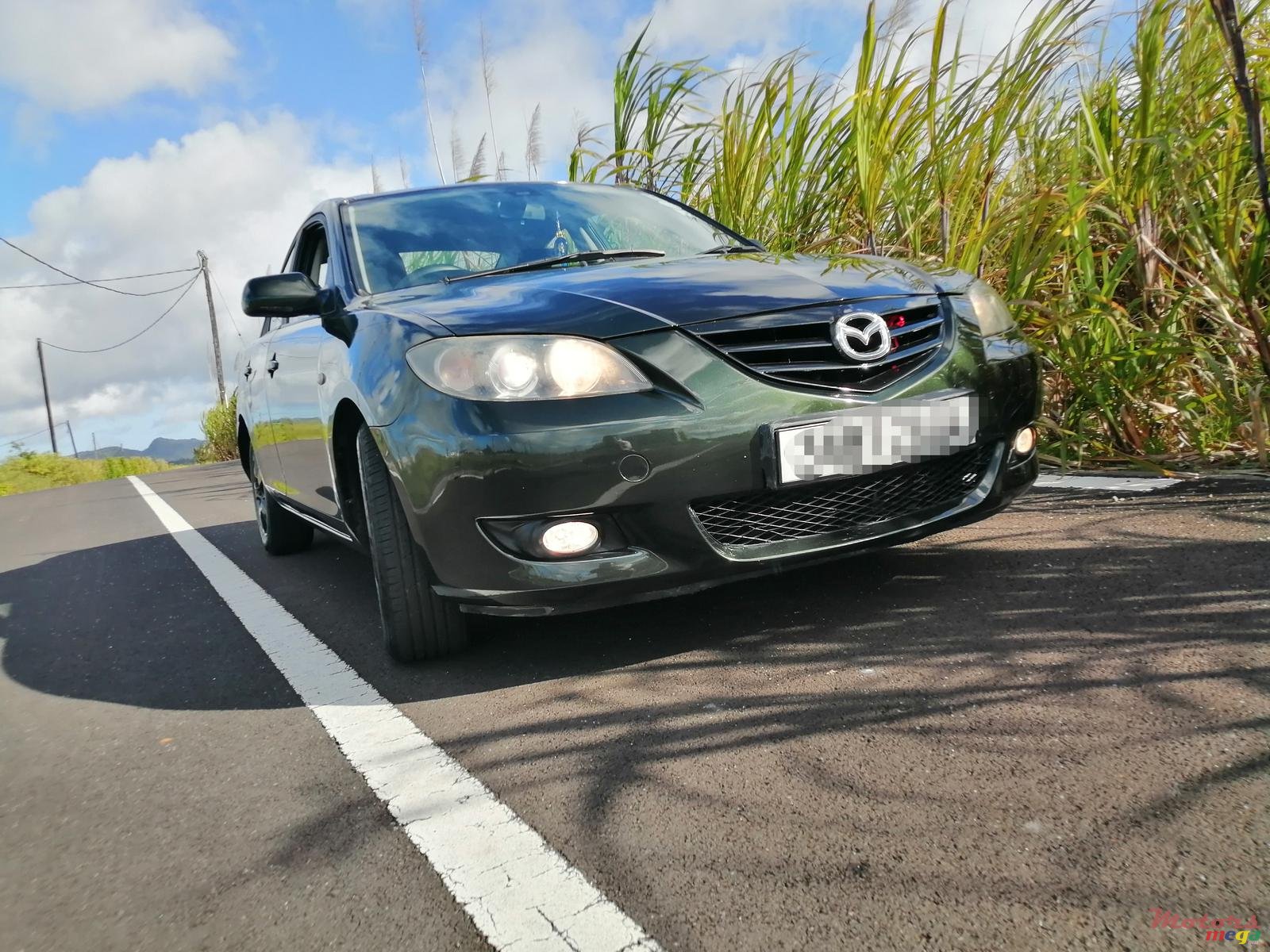 2004' Mazda 3 photo #1