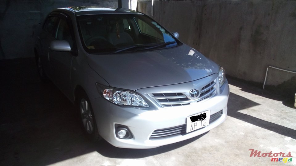 2012' Toyota Corolla G saloon photo #7