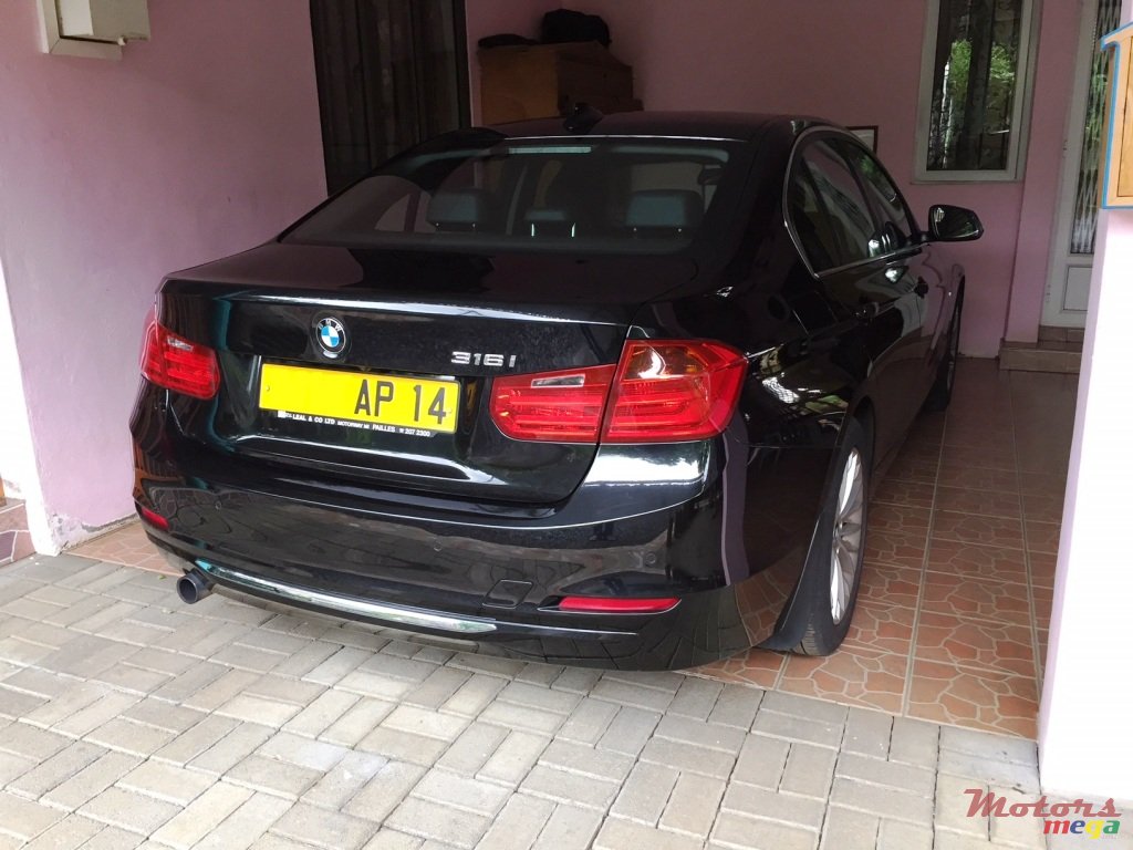 2014' BMW 316 316iA photo #1
