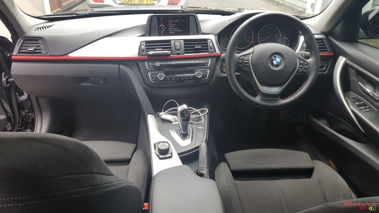 2012' BMW 316i photo #7
